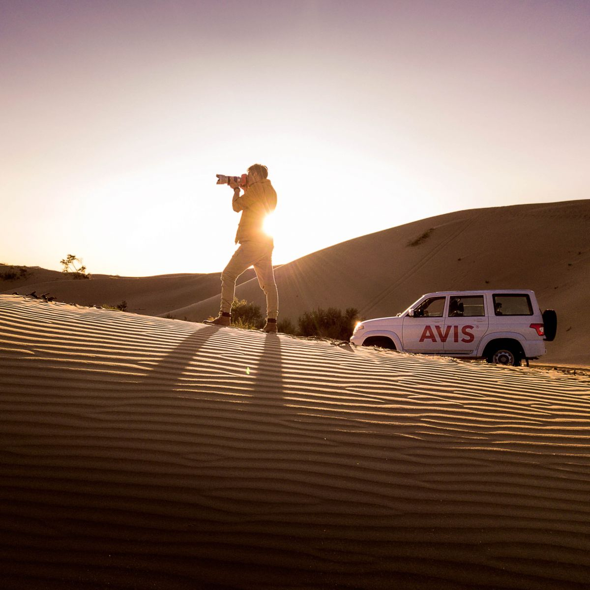 A family planning their Mongolia adventure with an Avis rental car