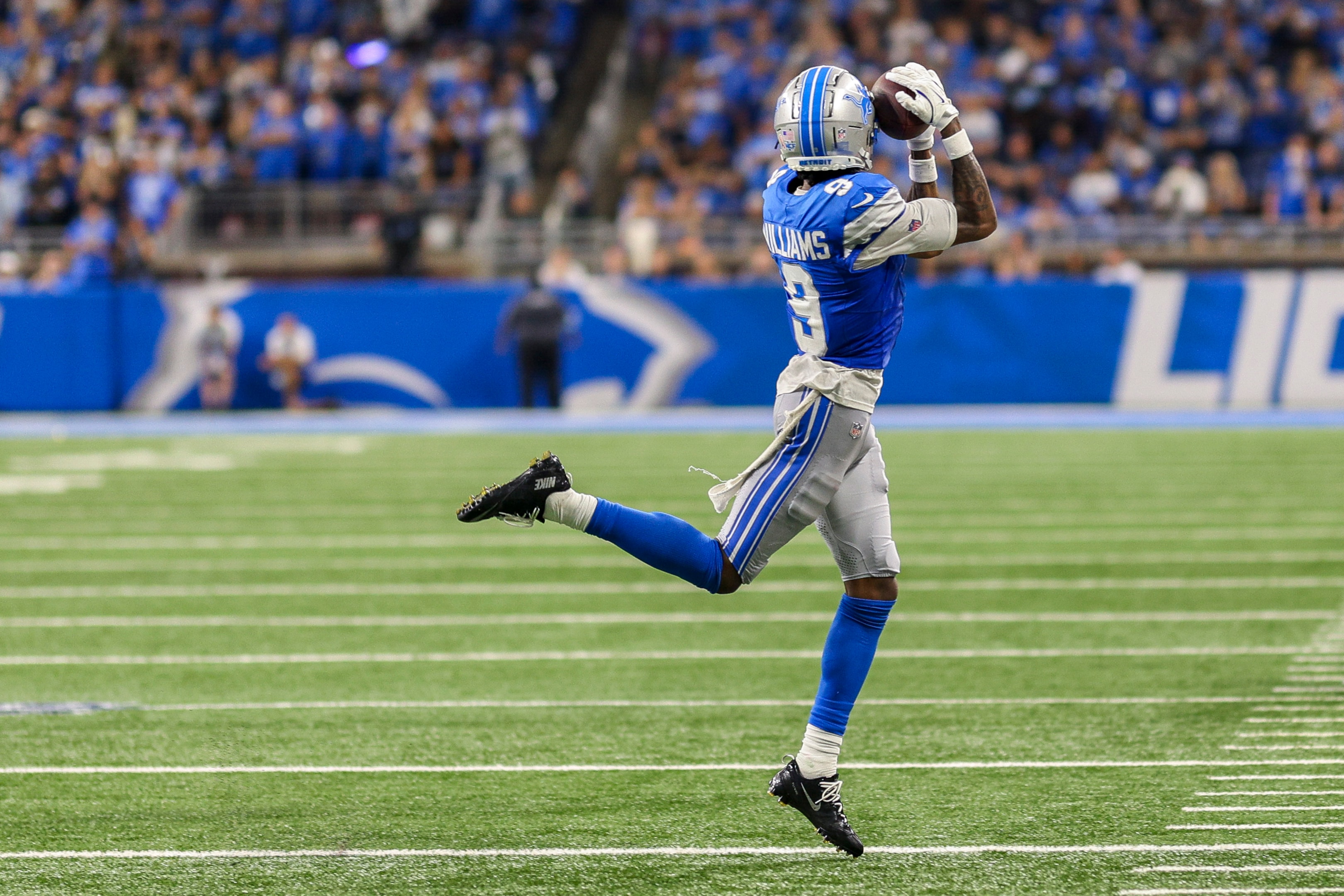 Jameson Williams of the Detroit Lions catches a pass in the second half of a game against the Tampa Bay Buccaneers at Ford Field on September 15, 2024 in Detroit, Michigan.