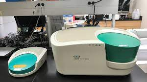 QX ONE Droplet Digital PCR (ddPCR) System on table in laboratory