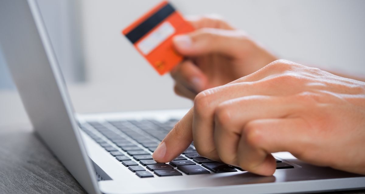 Online banking debit card payment being made by a customer to a merchant