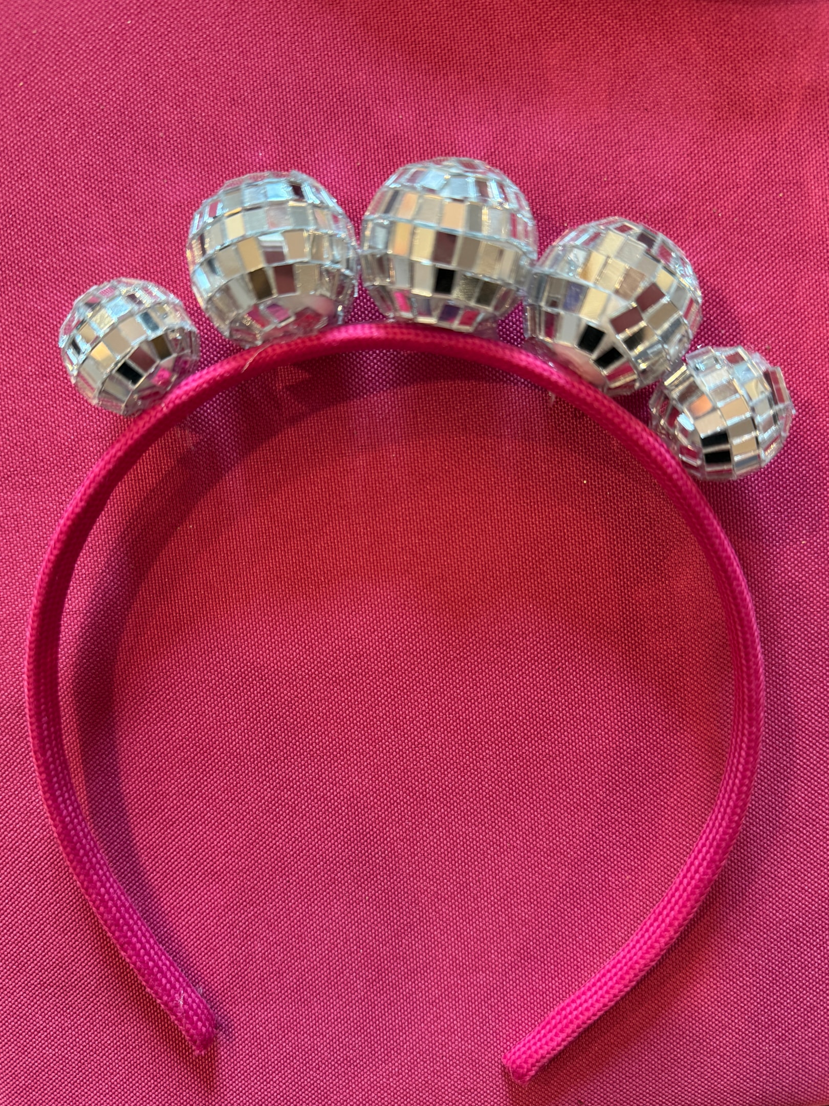Along with the dresses you can make your own disco ball headband. I made my with the small size disco balls. Fun for all occasions.