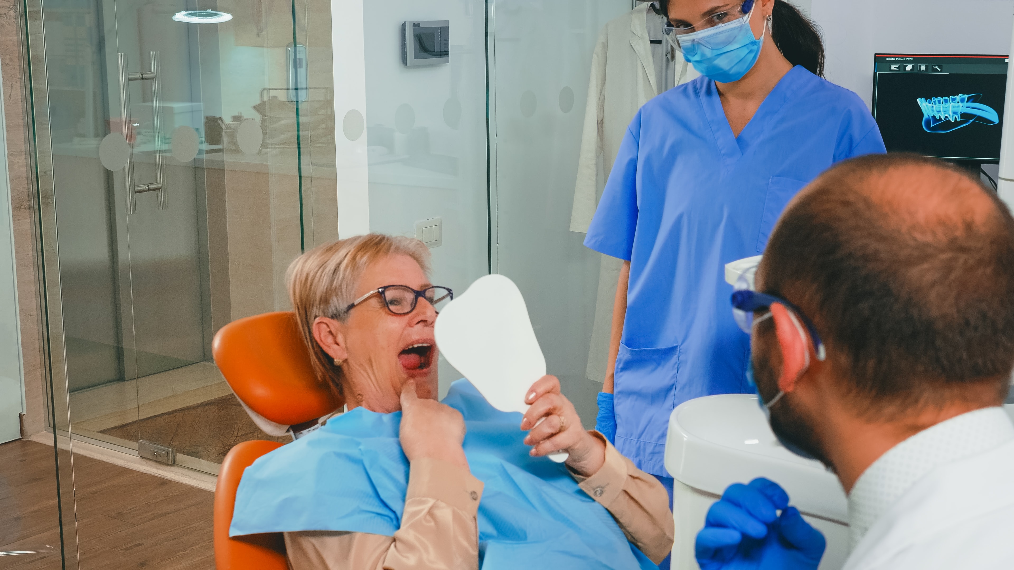 woman post dental implant procedure