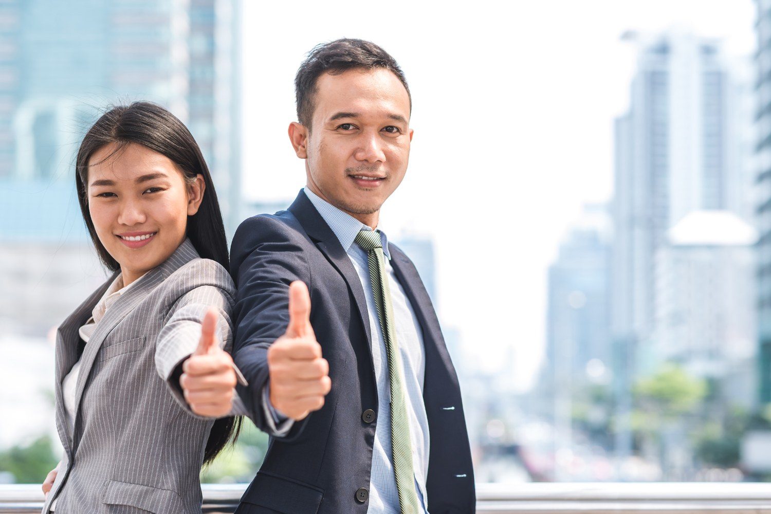 Managers giving thumbs up.