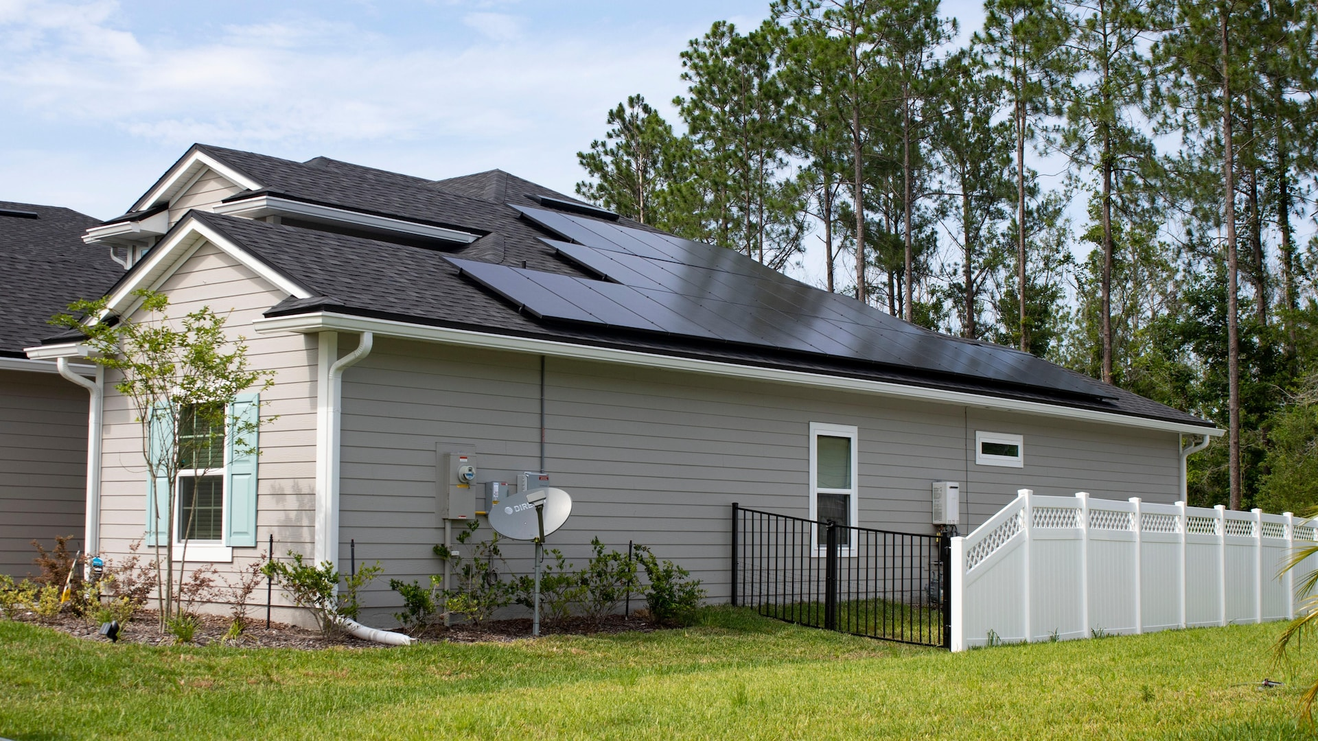 Solar panels installed on the roof of a house. 