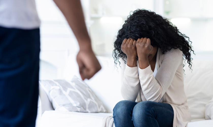 An woman being abused by one of her family members