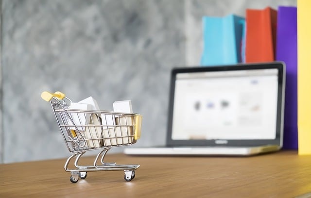 miniature shopping cart, shop, retail, cart, laptop, table, closeup, retail, retail, retail, retail, retail