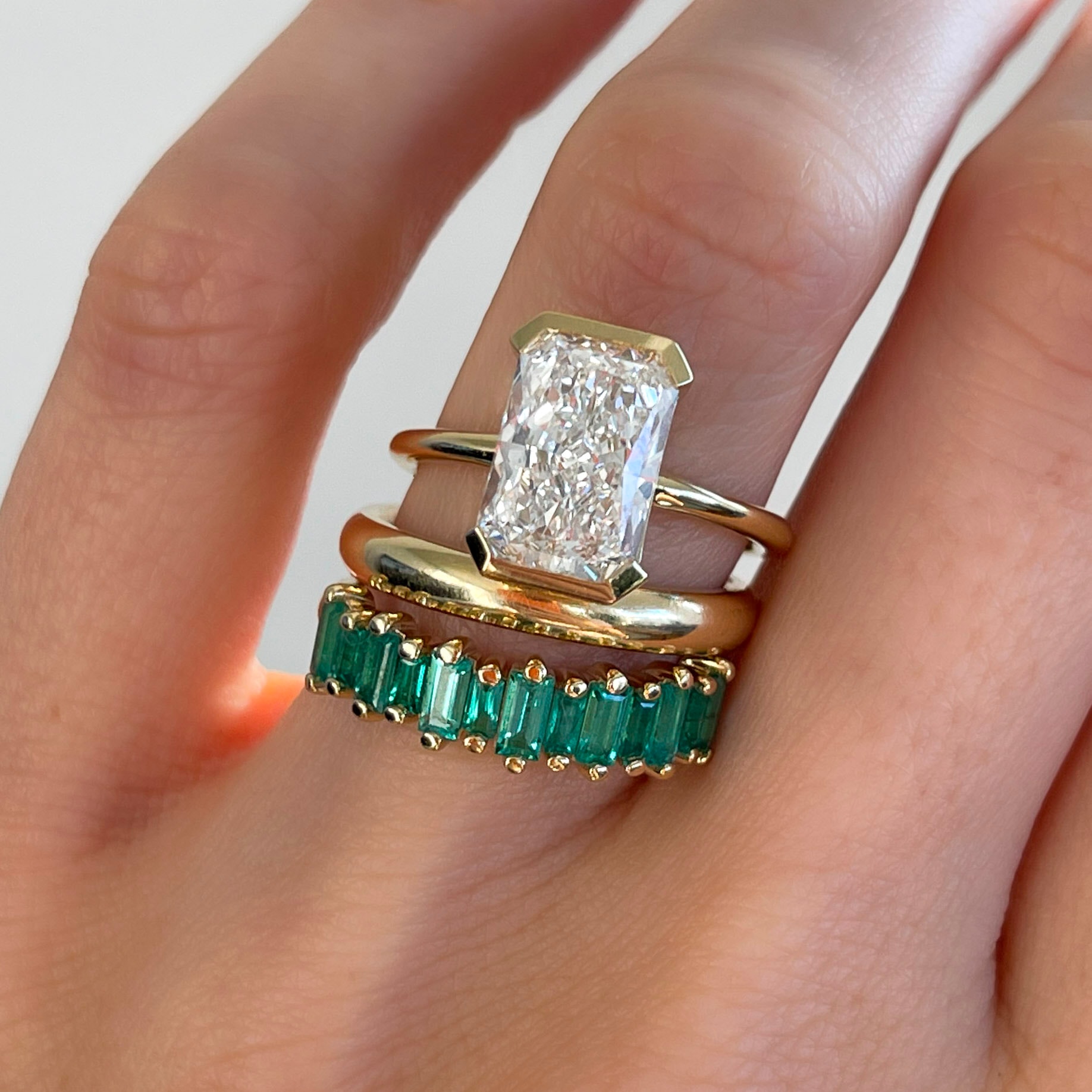 North South Half Bezel Solitaire Engagement Ring With Elongated Radiant Cut Diamond
