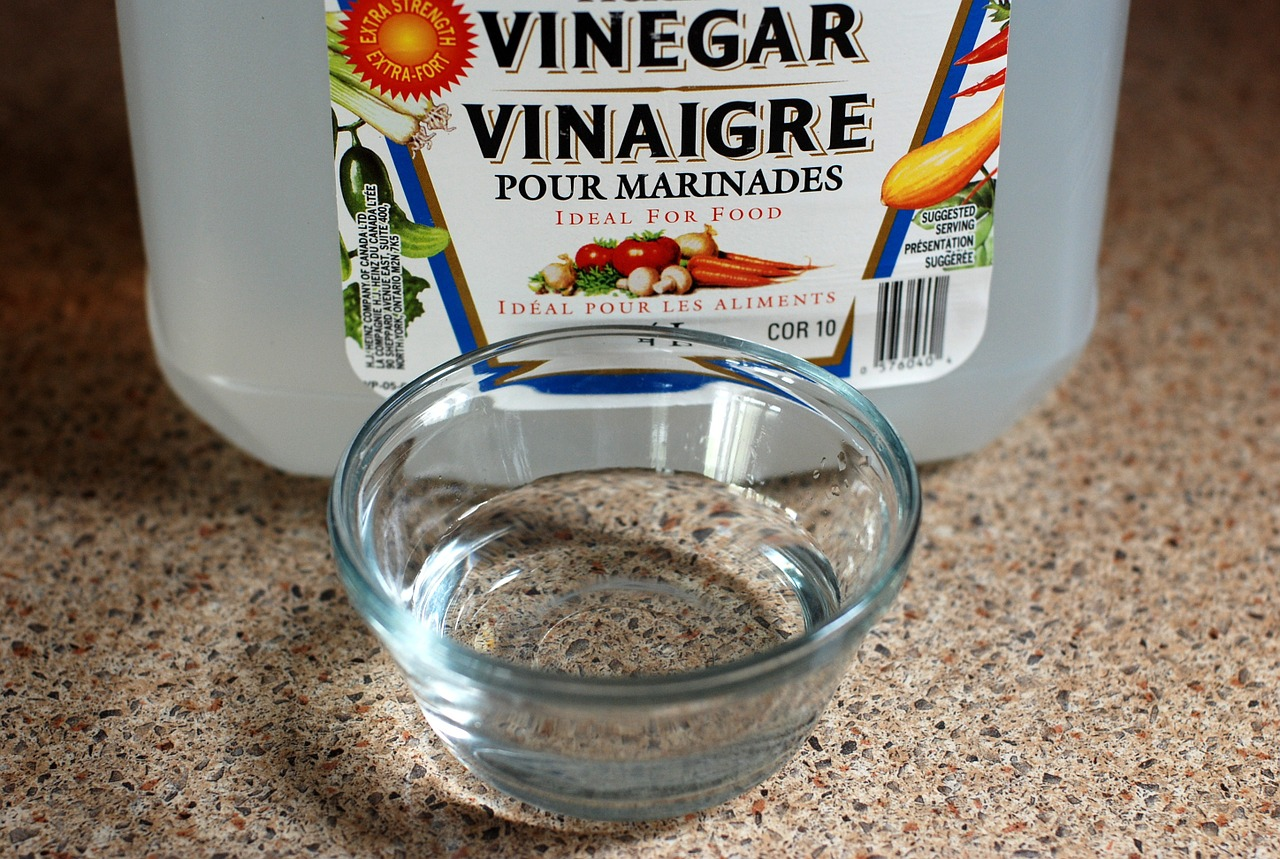 Use distilled white vinegar and cold water to clean your carpet