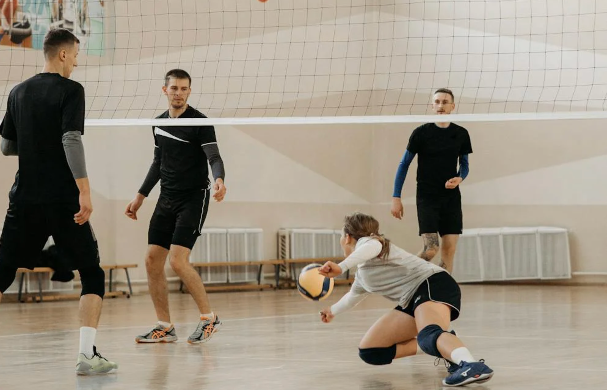 Photo by Pavel Danilyuk: https://www.pexels.com/photo/group-of-people-playing-volleyball-6203562/