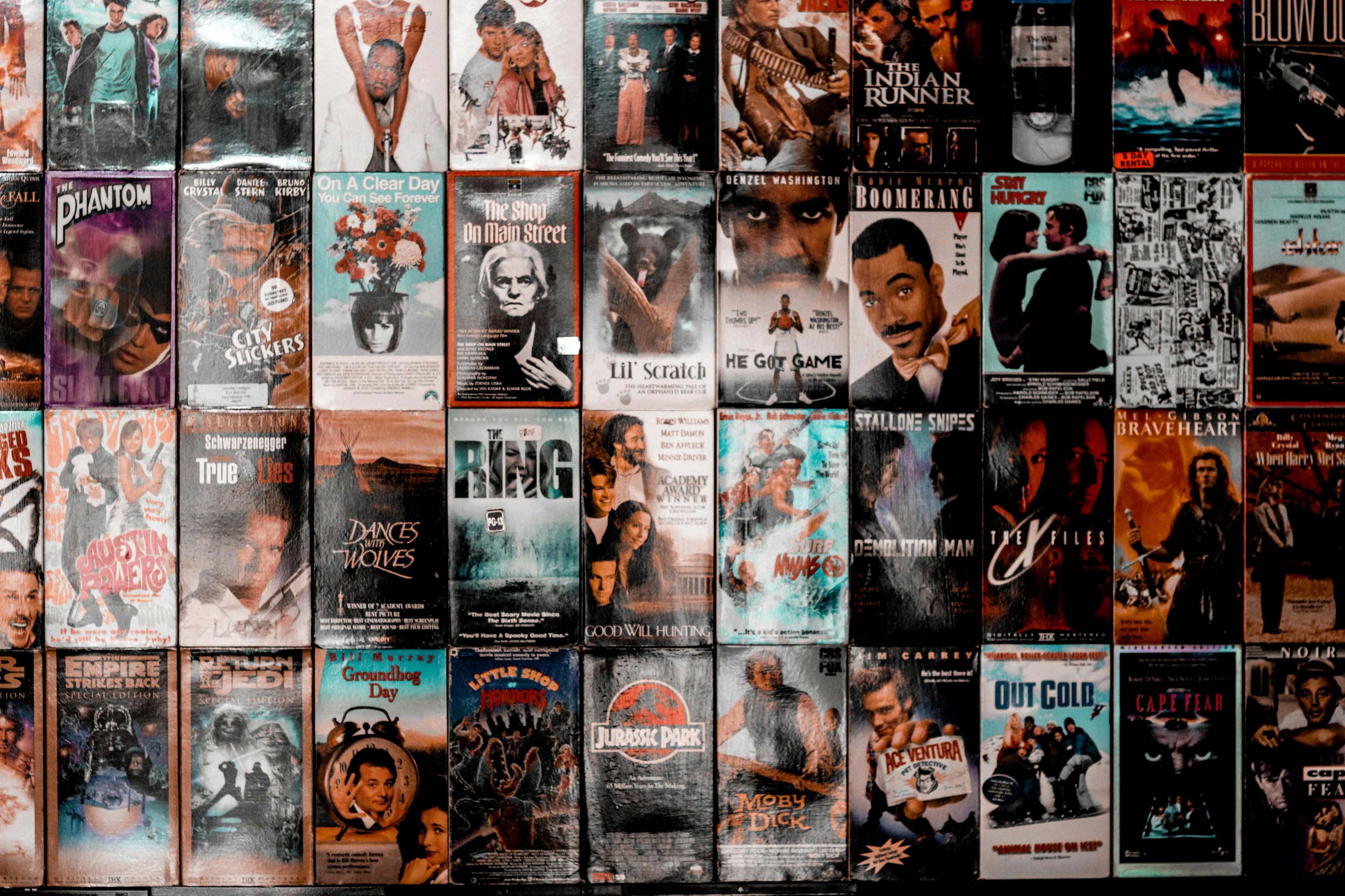 A wall of many different movie posters.