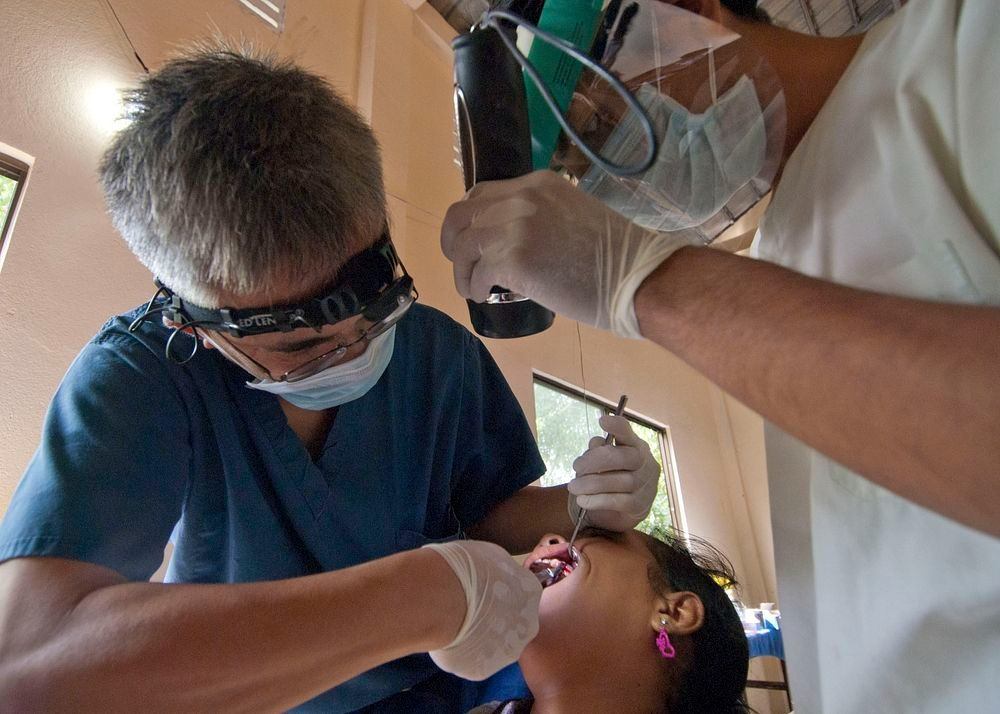 Dentist doing a dental procedure