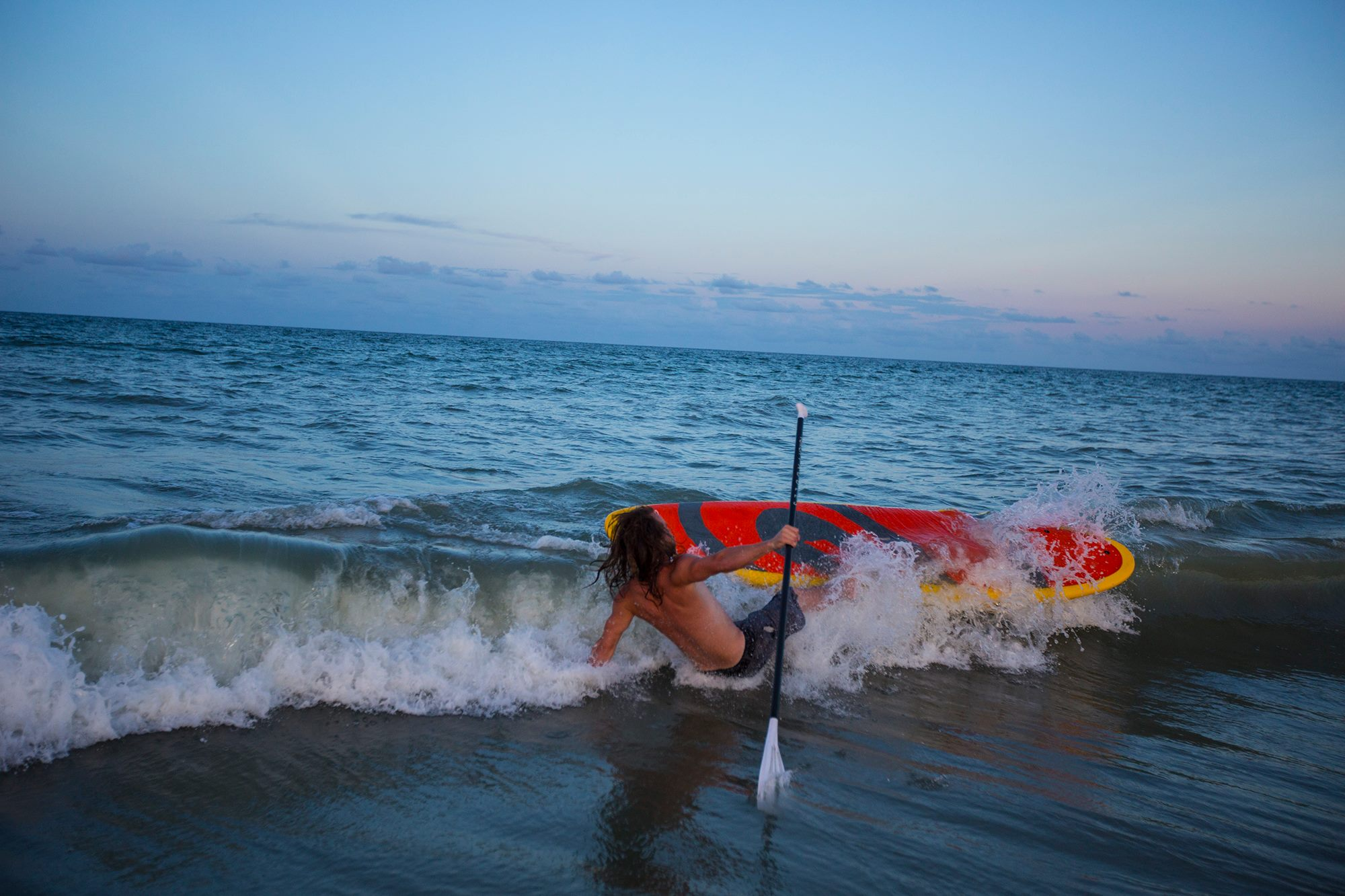 falling off a paddle board