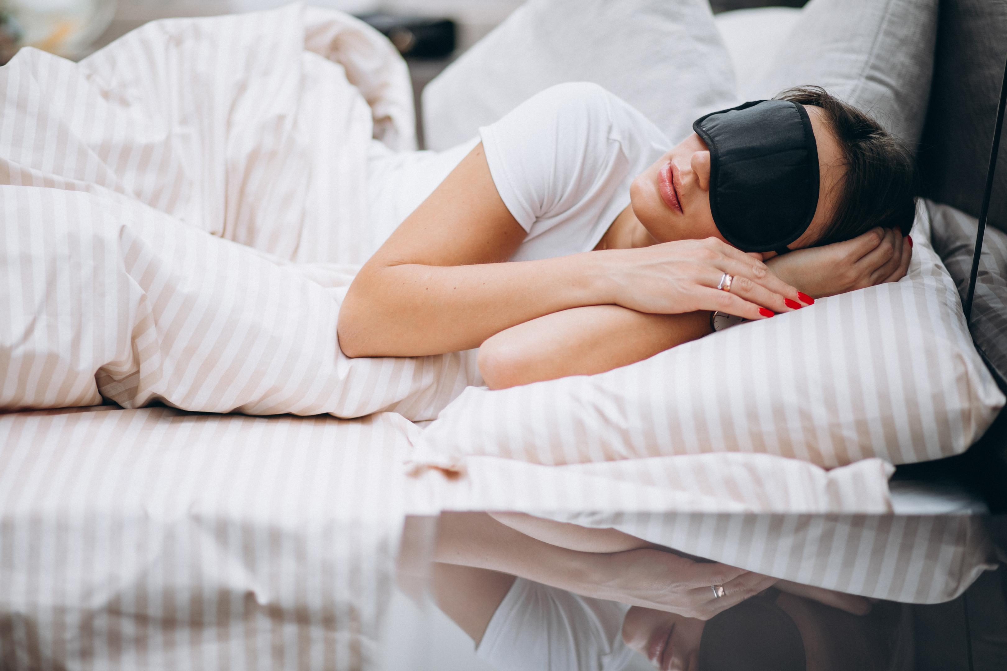 woman wearing sleep mask