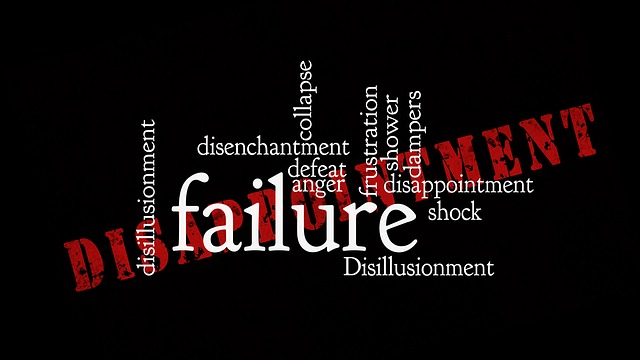 Words on a black background like disillusionment, disenchantment, collapse, defeat. anger, frustration, shock with the word disappointment in red.