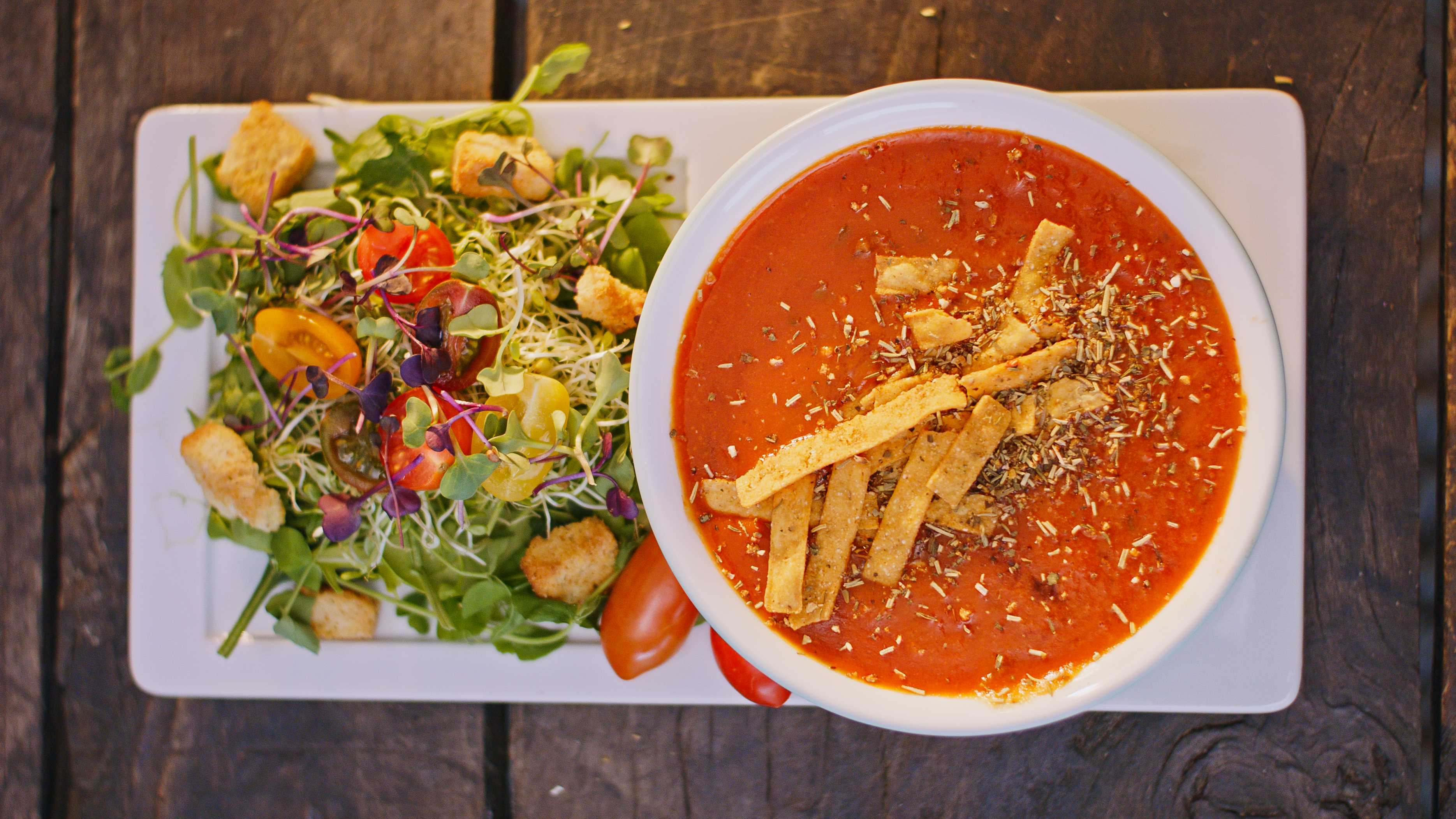 A bowl of hearty chicken soup with vegetables and chicken broth