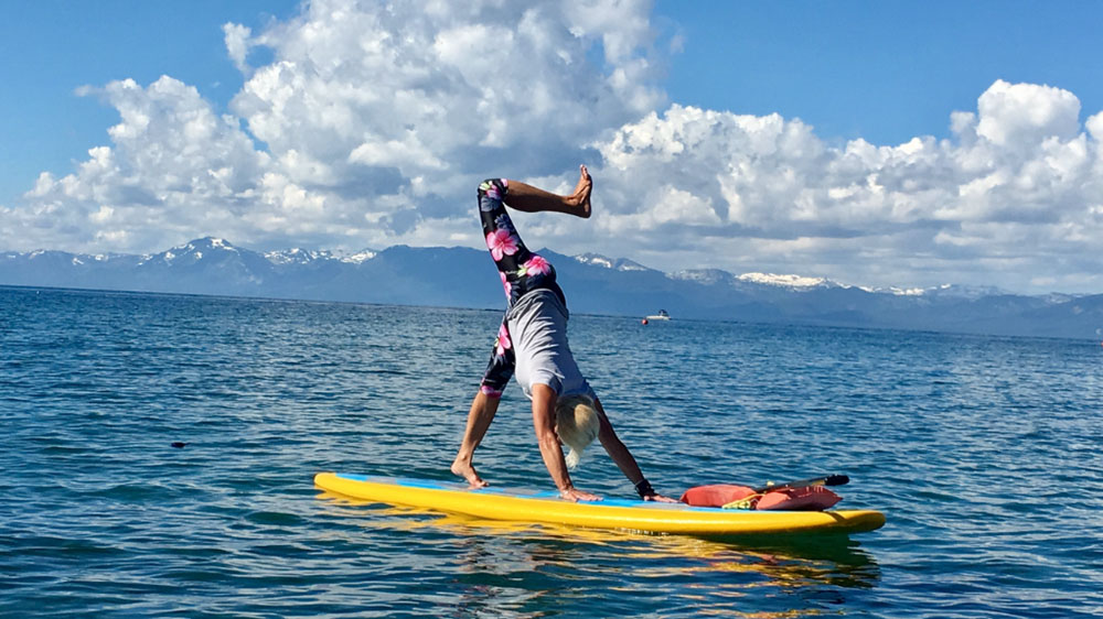 Doing pilates on a stand-up paddle (sup) board