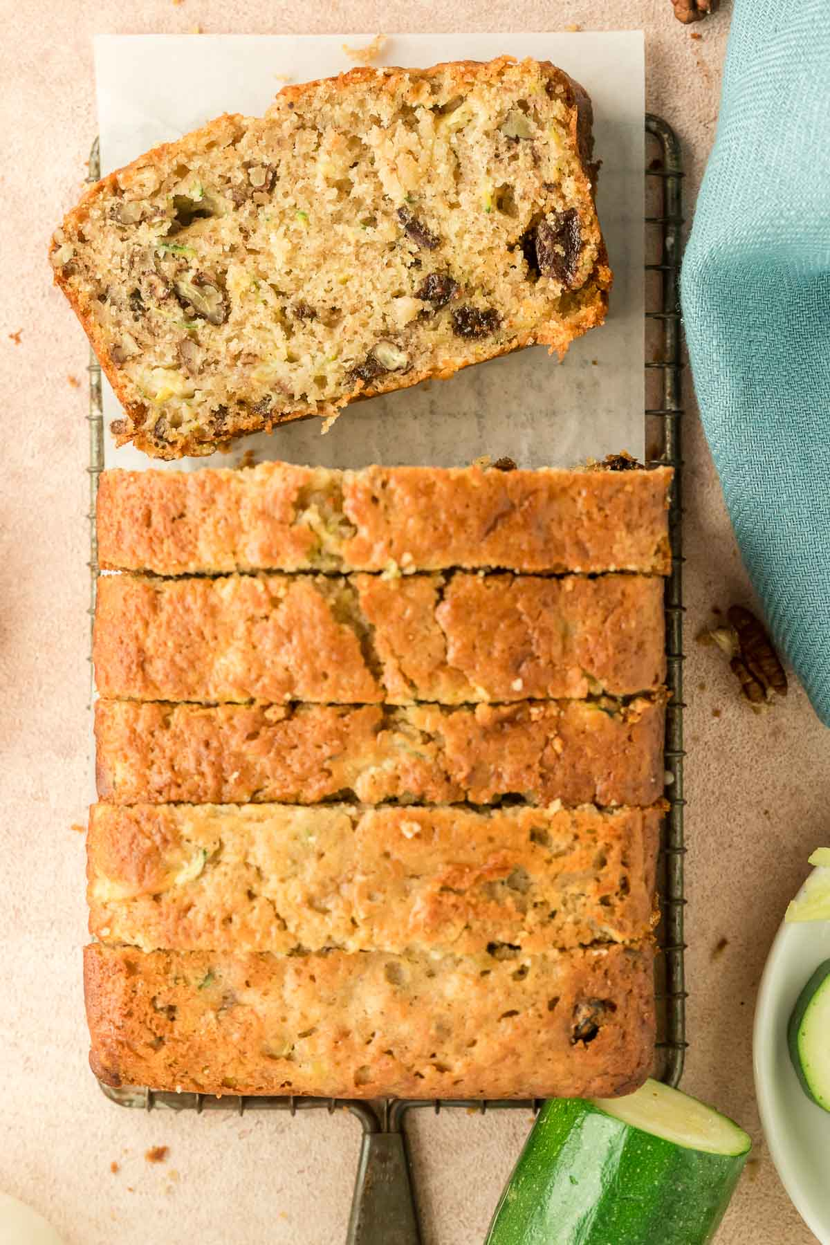 sliced pineapple zucchini bread on a wire rack