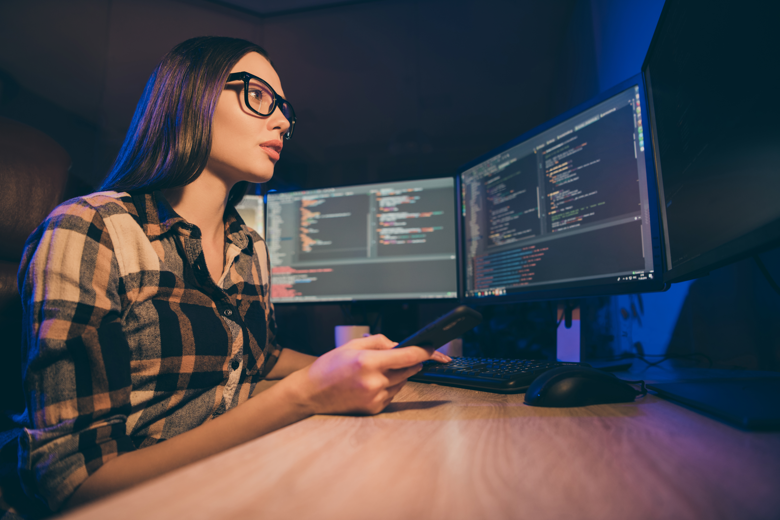 Female programmer using Python at work