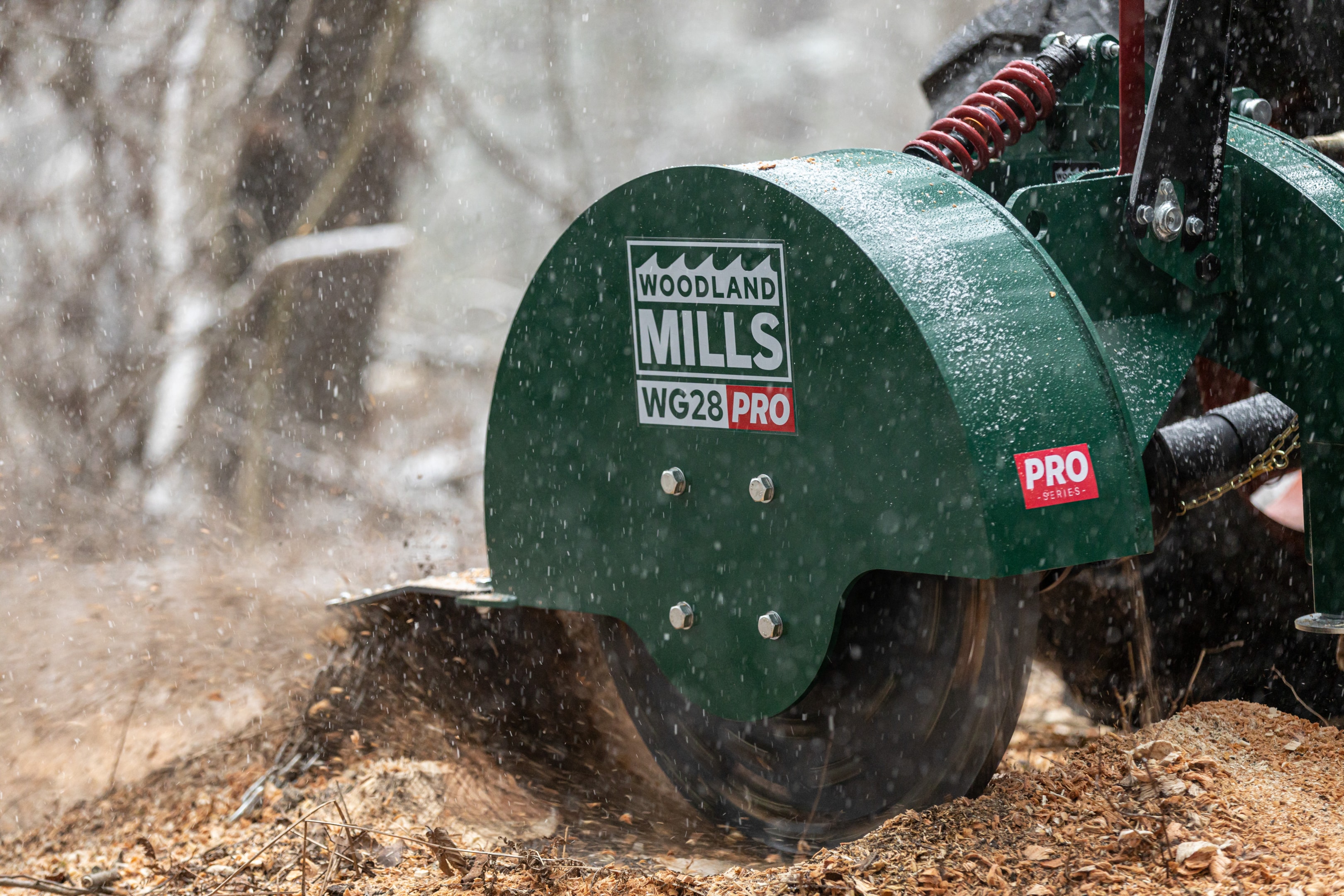 A Woodland Mills WG28 PRO stump grinder, which has a high efficiency for removing stumps with your tractor's horsepower.