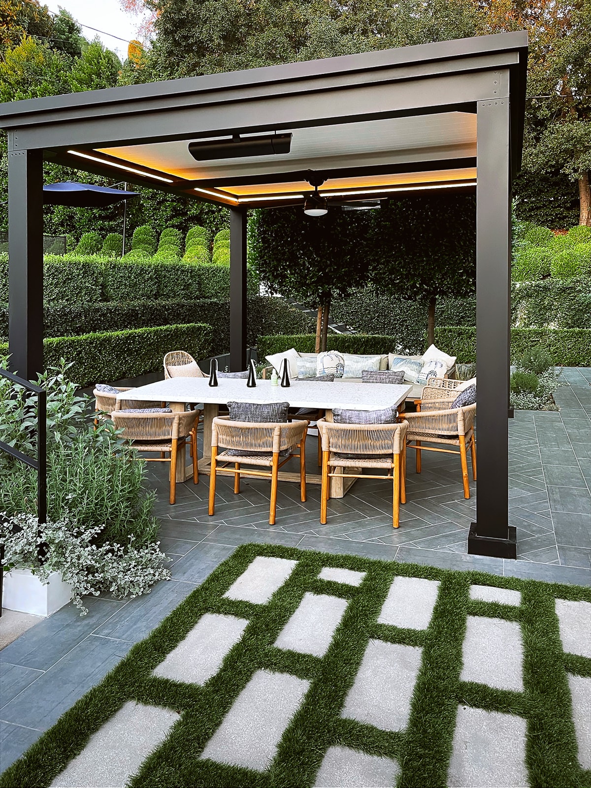 Adding furniture under your pergola will give your guests the comfort of an indoor living space but outdoors.