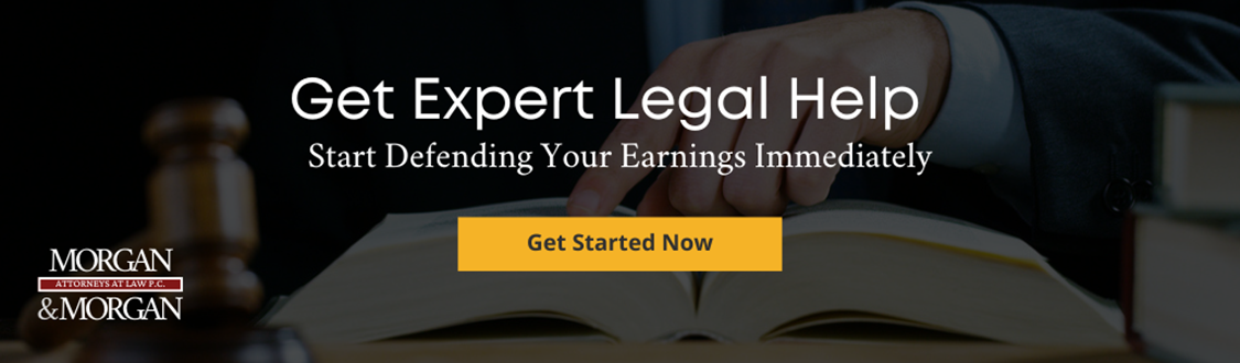 Experienced Georgia lawyer advising a client on how bankruptcy proceedings can prevent foreclosure and allow them to stay in their home longer.