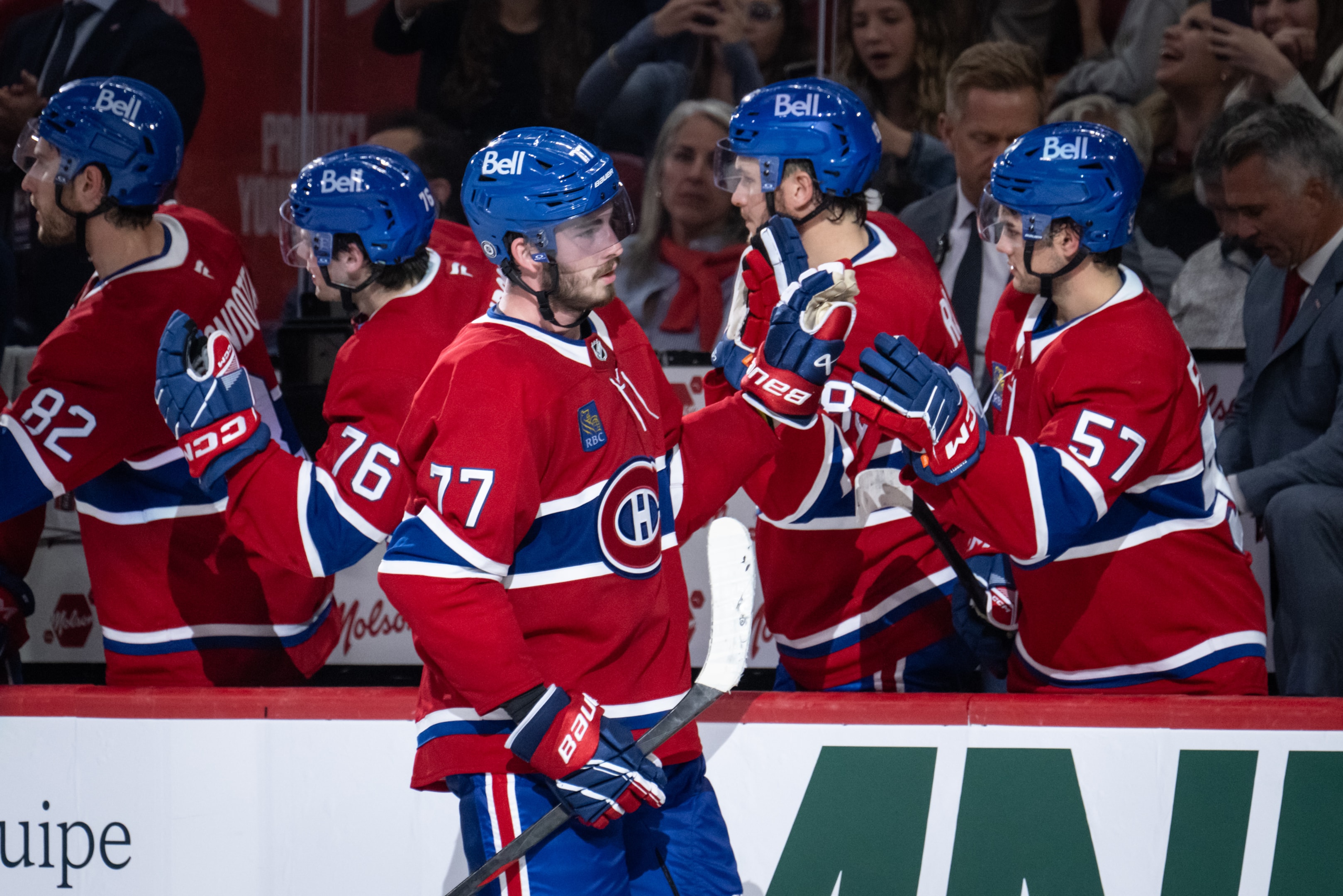 Kirby Dach of the Montreal Canadiens celebrates with teammates after scoring a goal during the third period of the NHL pre-season game between the Toronto Maple Leafs and the Montreal Canadiens on Sept 28, 2024, at the Bell Centre in Montreal, QC.