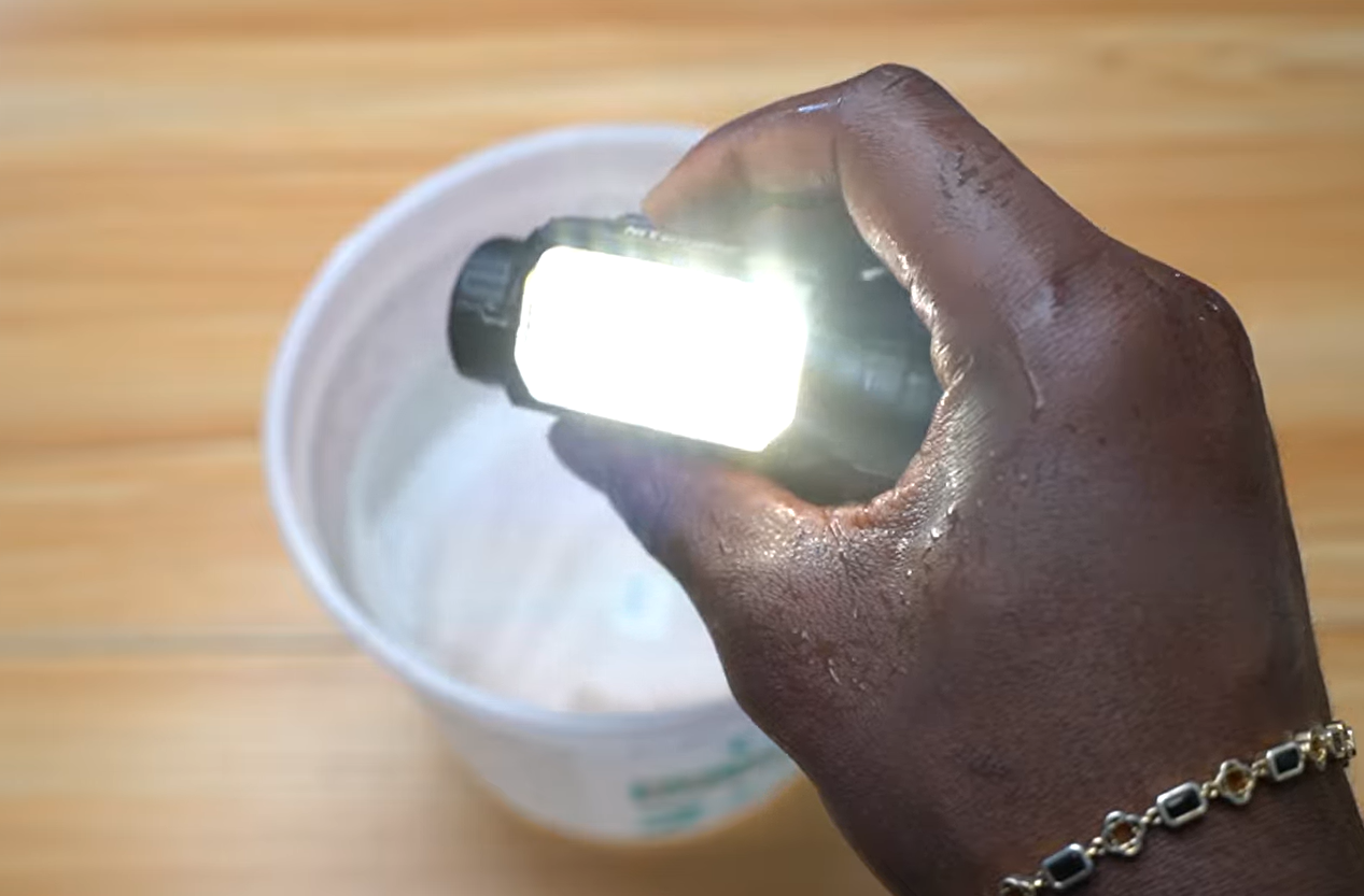 Nitecore headlamp submerged in water