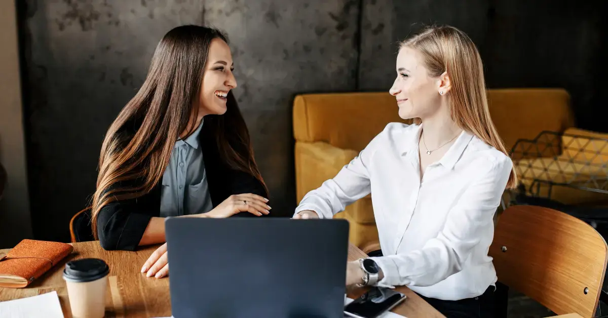 Woman discussing 5329 tax form penalties and IRA withdrawal exceptions with a tax professional.