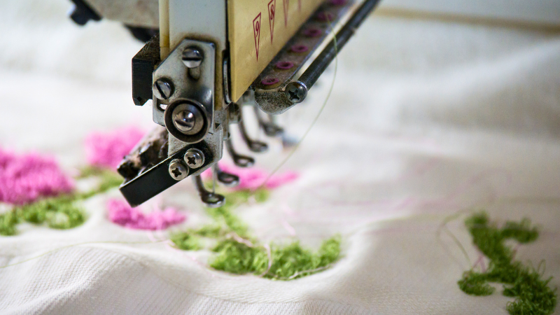 A close up of an embroidery machine