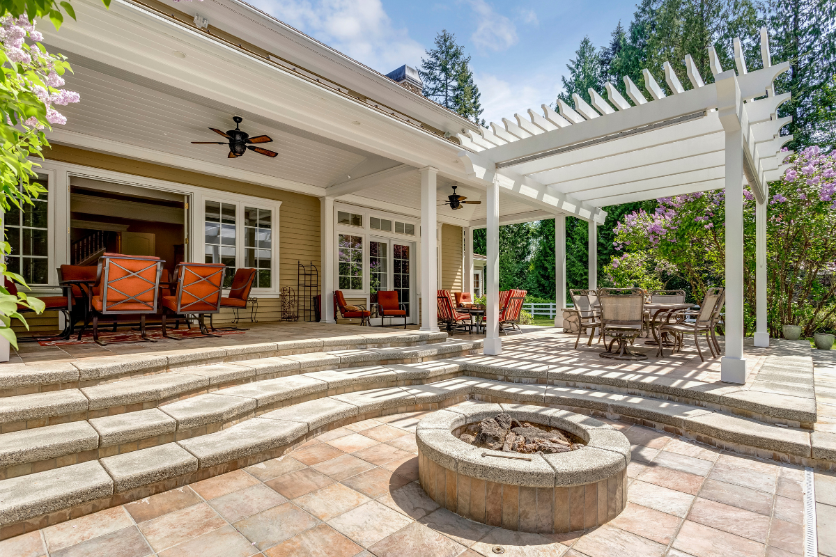 A DIY outdoor furniture setup on a small front porch, demonstrating creative porch decorating ideas.