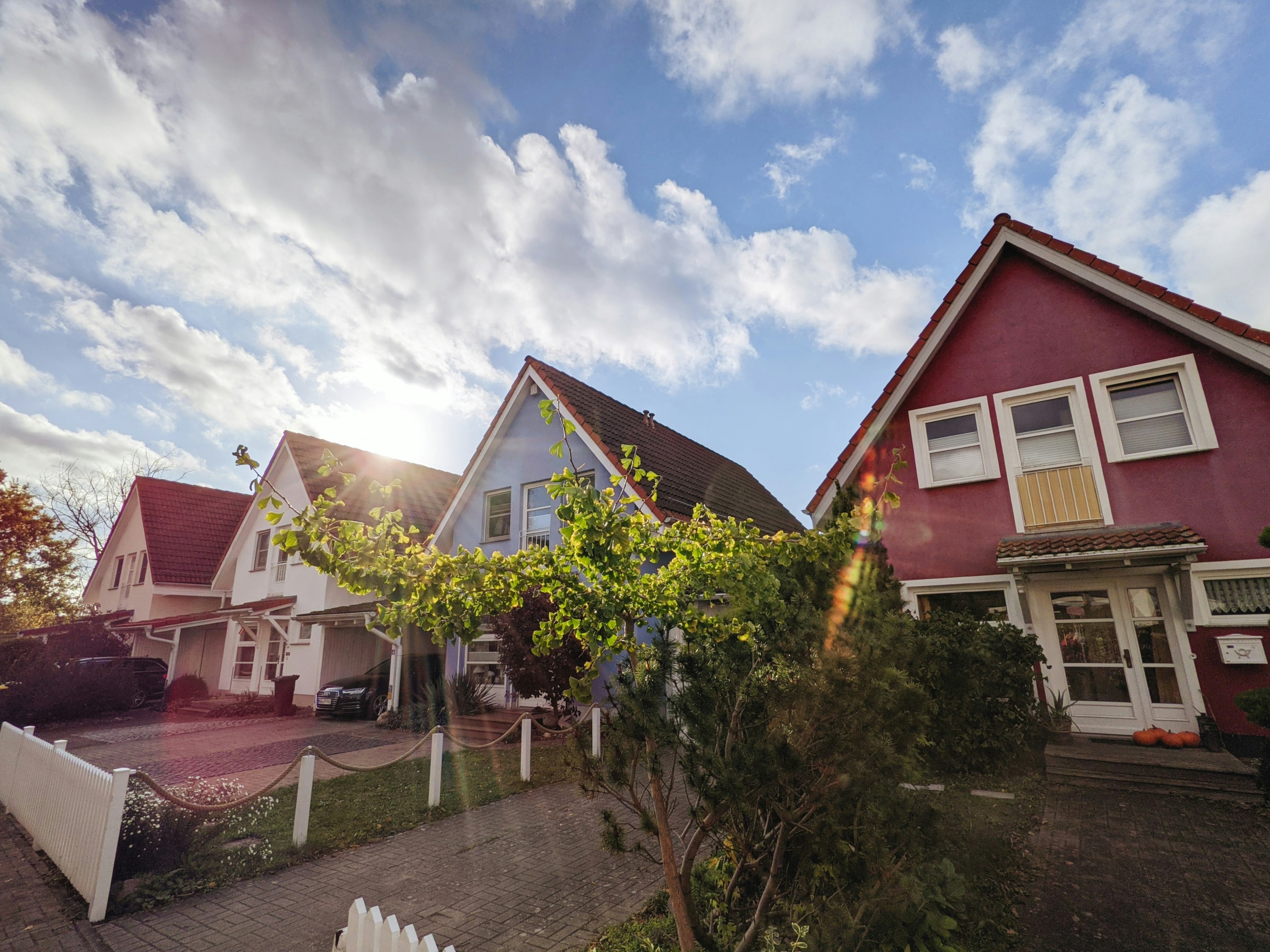 Row of single family houses in small town, being targeted by real estate investor for investing opportunity.