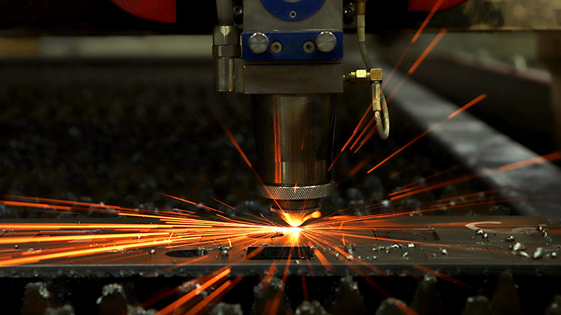 Fiber Laser Cutting through Thick Metal Sheet