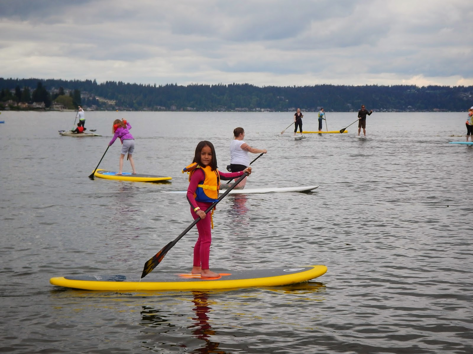 kids on paddle boards