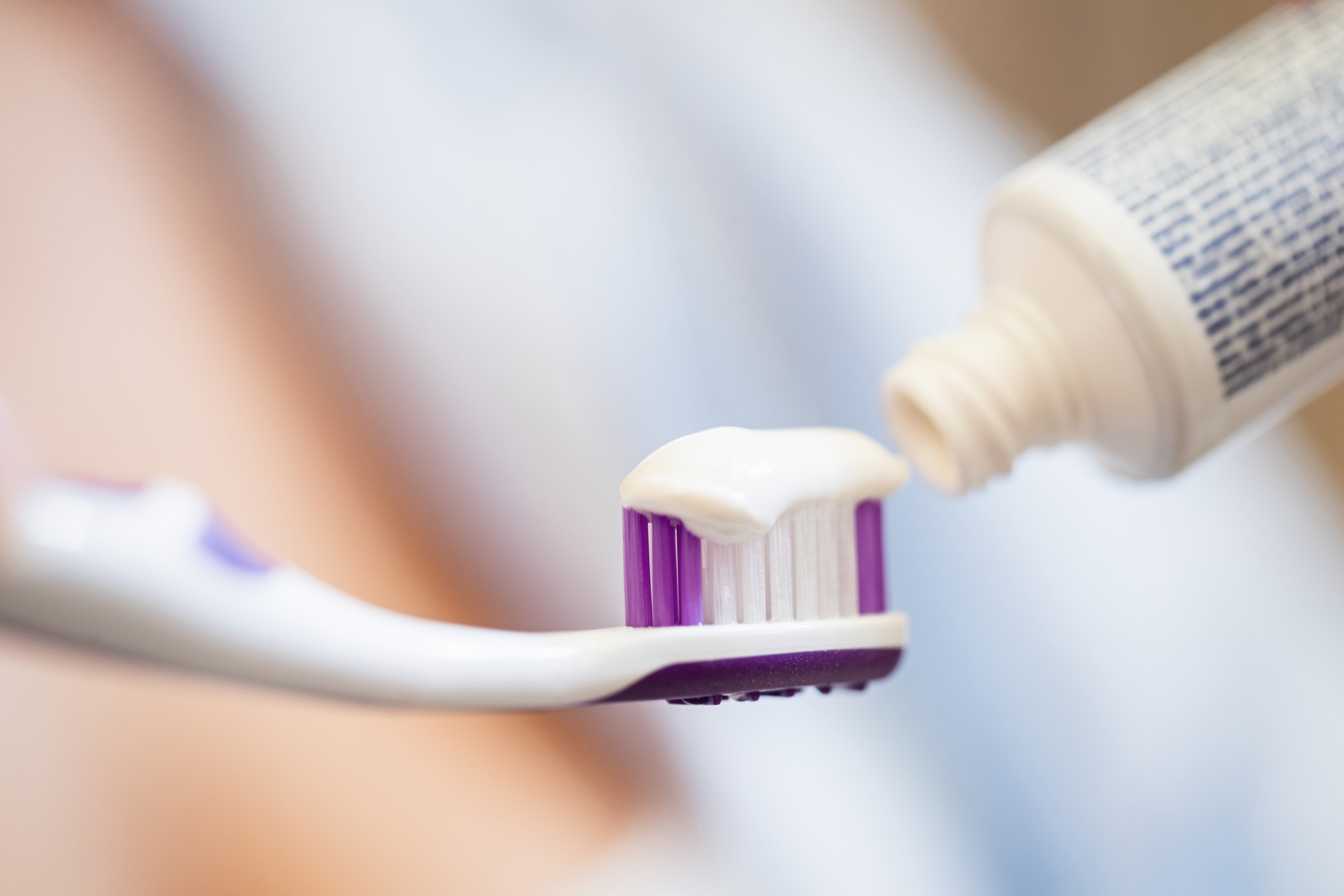 an image of a toothpaste and a toothbrush.