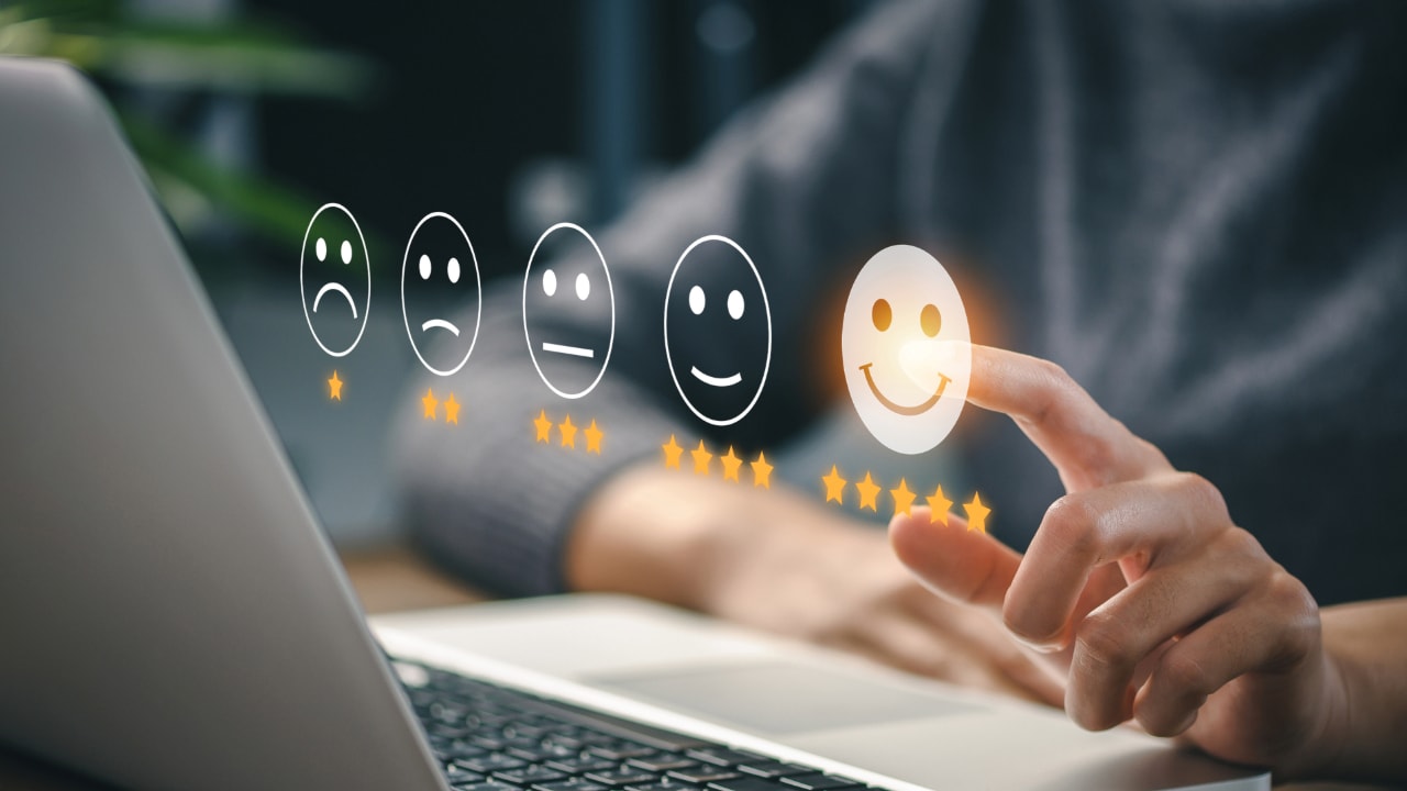 satisfaction scale with smiling faces