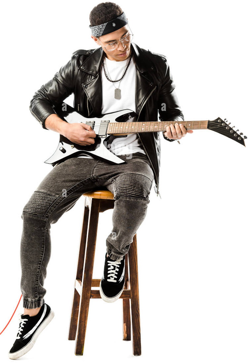 man holding an electric guitar in a seated position