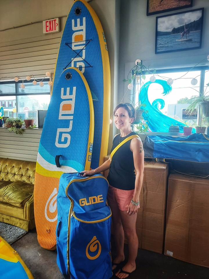 advanced paddlers on an inflatable stand up paddle board