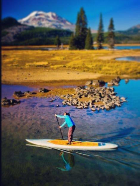 paddling a hard paddle board