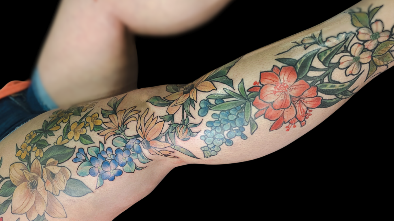 Colorful floral leg sleeve by Mel Perlman.