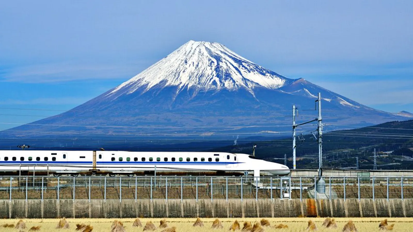 Train Passing Mt. Fuji in Japan, photo by Sean Pavone/Alamy