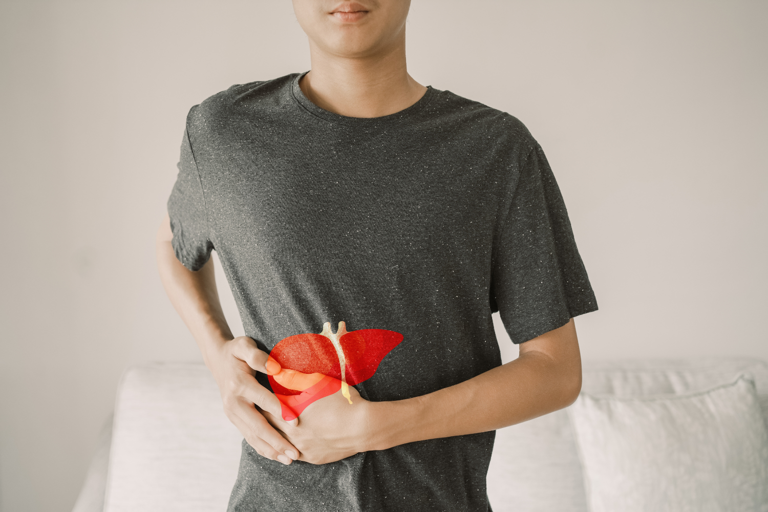 Person holding his side where the liver is located.