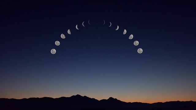 Picture of all the moon phases against a dark sky