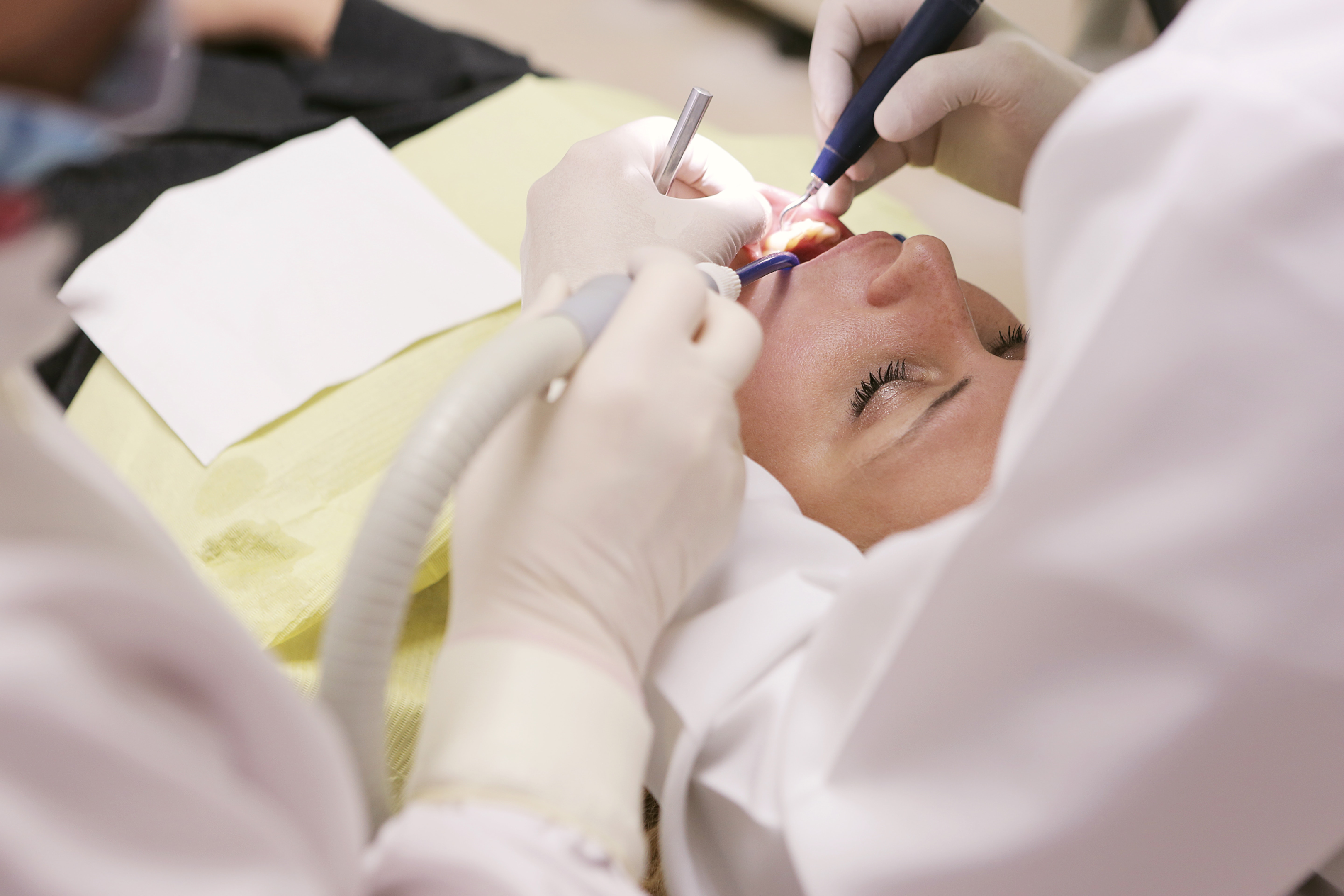Women getting dental sealant