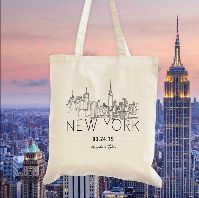A cotton tote bag with a gorgeous screen print decorating its cotton canvas