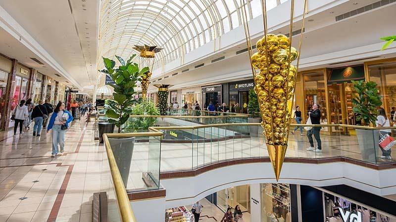 Wide shot of a shopping mall atrium