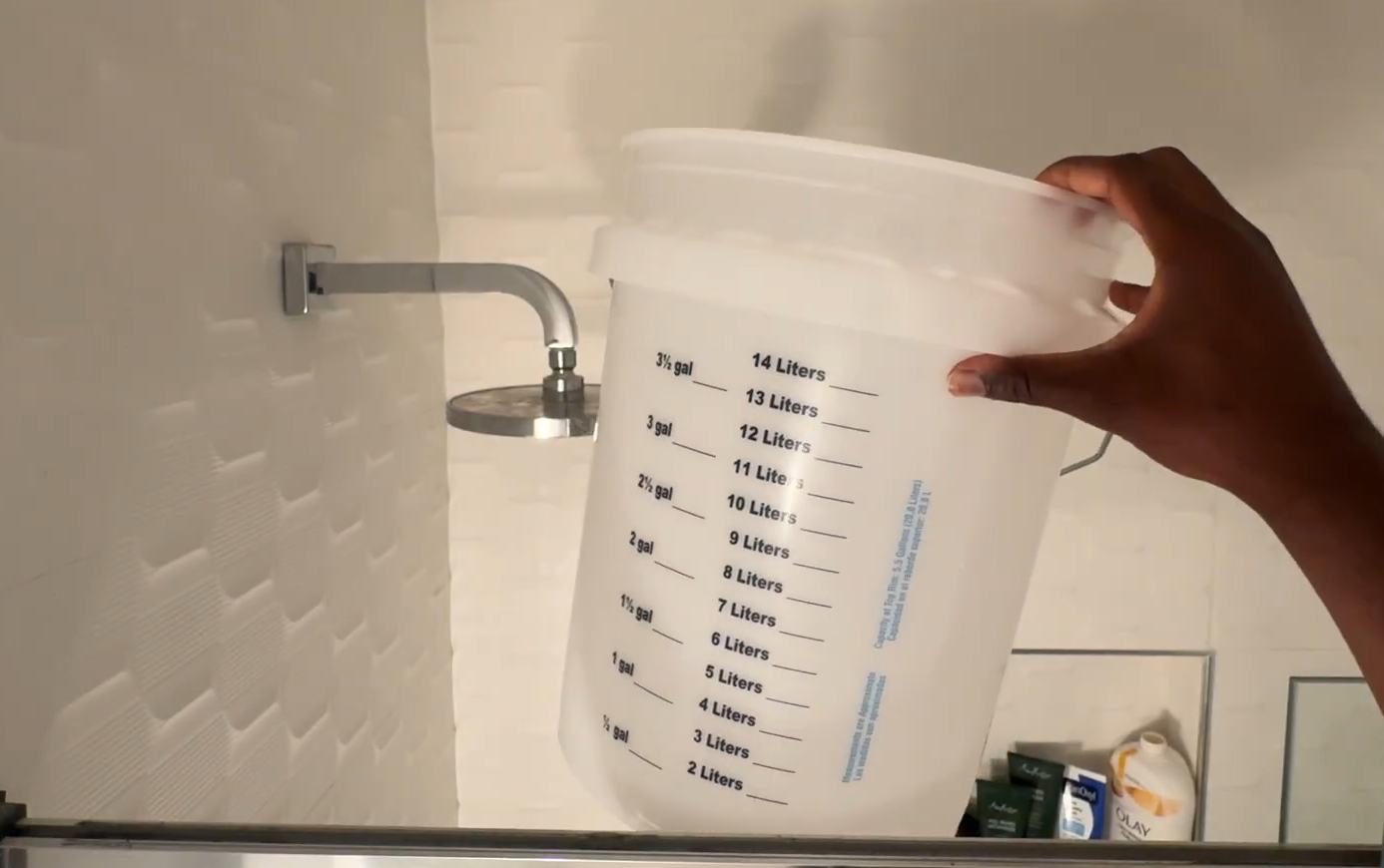 bucket of water with shower water