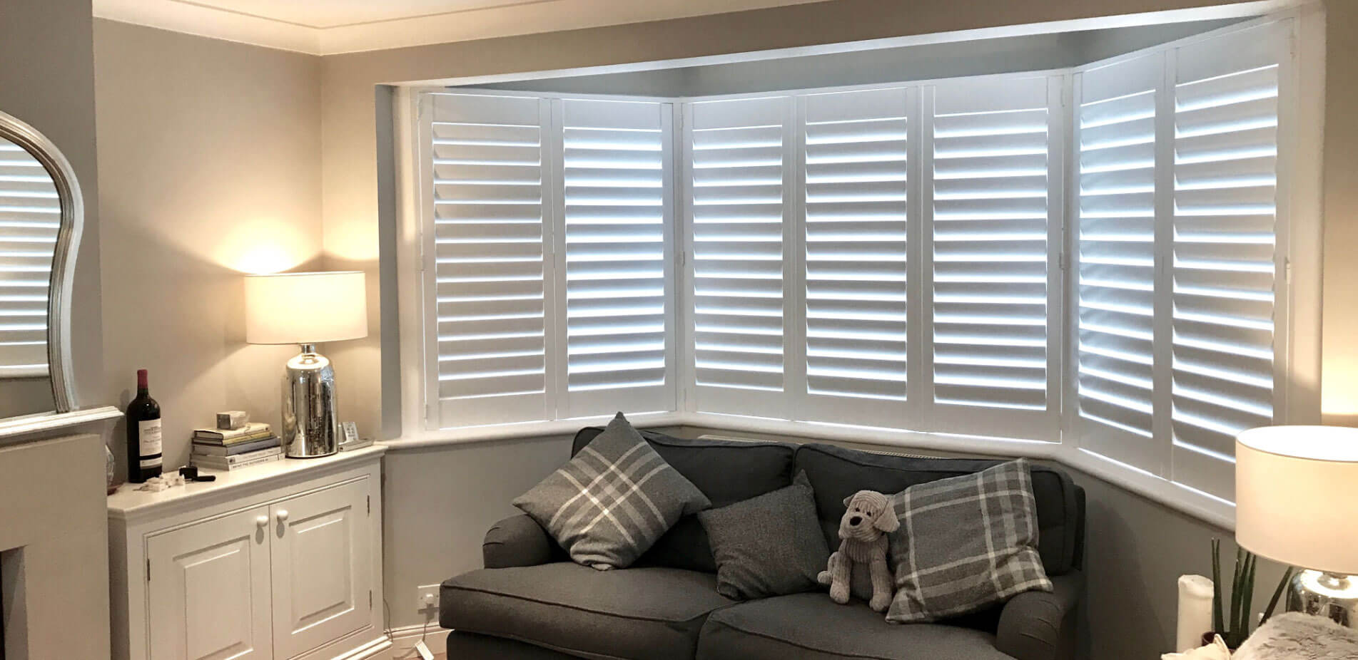 white plantation shutters in living room 