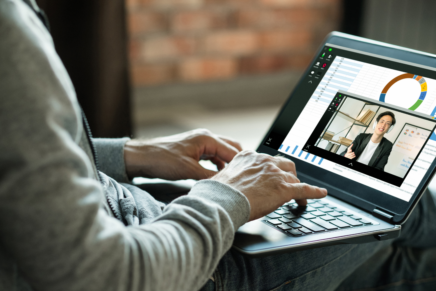 A remote employee shown on a manager's screen during virtual meeting.