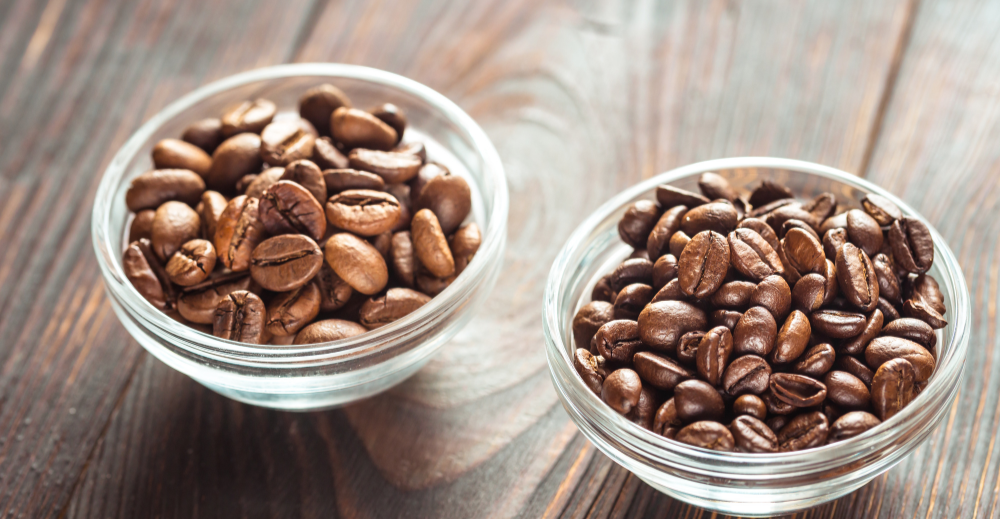 bowls of arabica and robusta beans