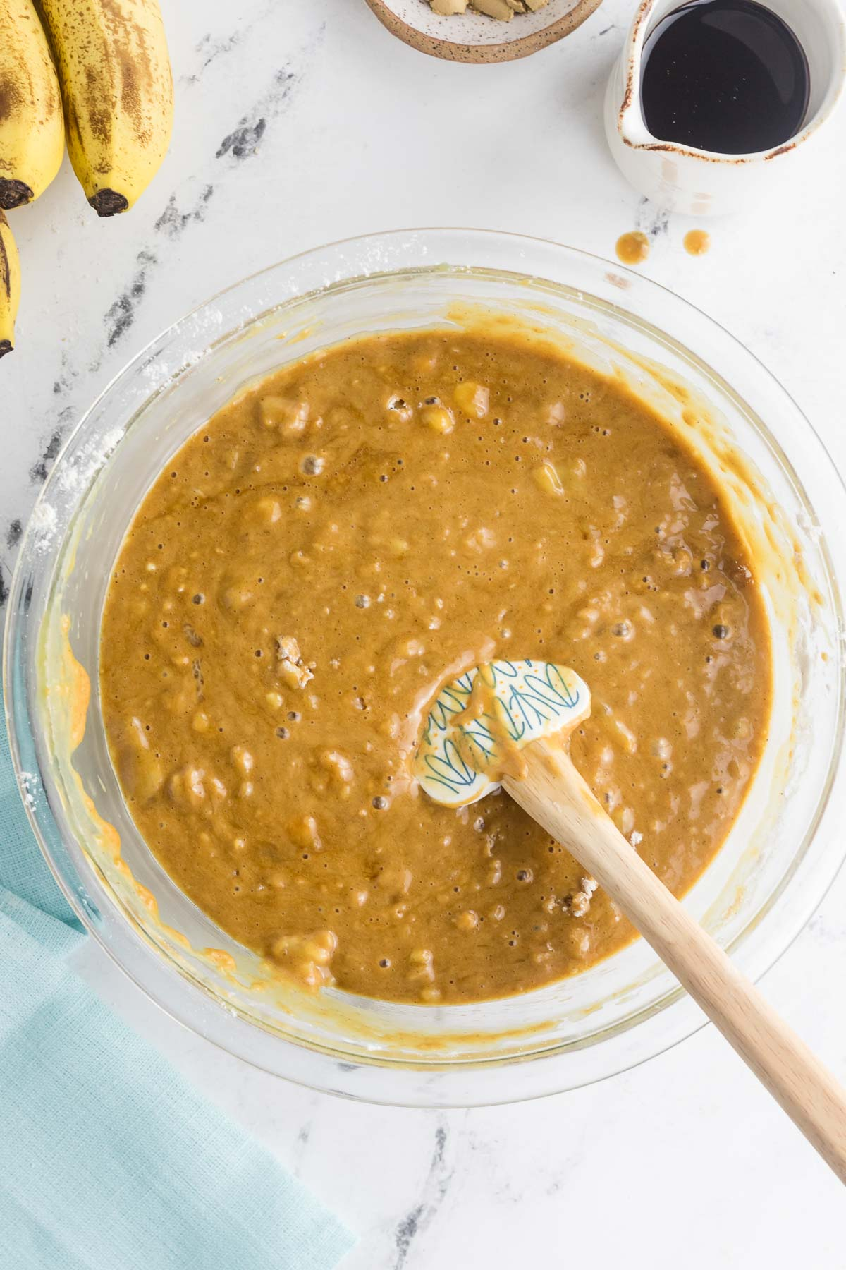 banana gingerbread batter in bowl with spatula